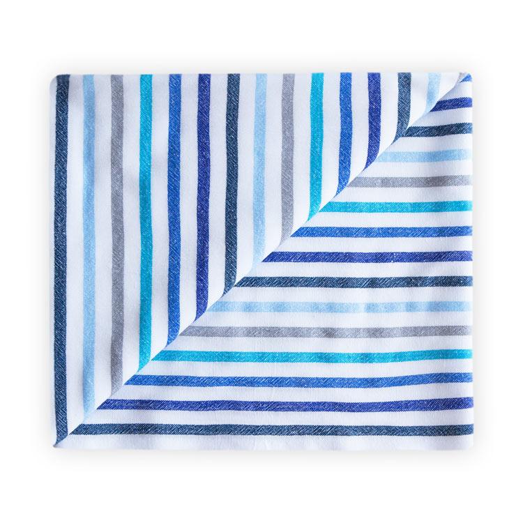 blue, grey and white large beach towel above